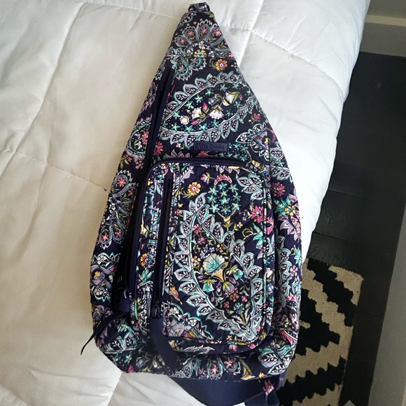 Vera Bradley Handbags - Vera Bradley Navy and Floral Sling Backpack